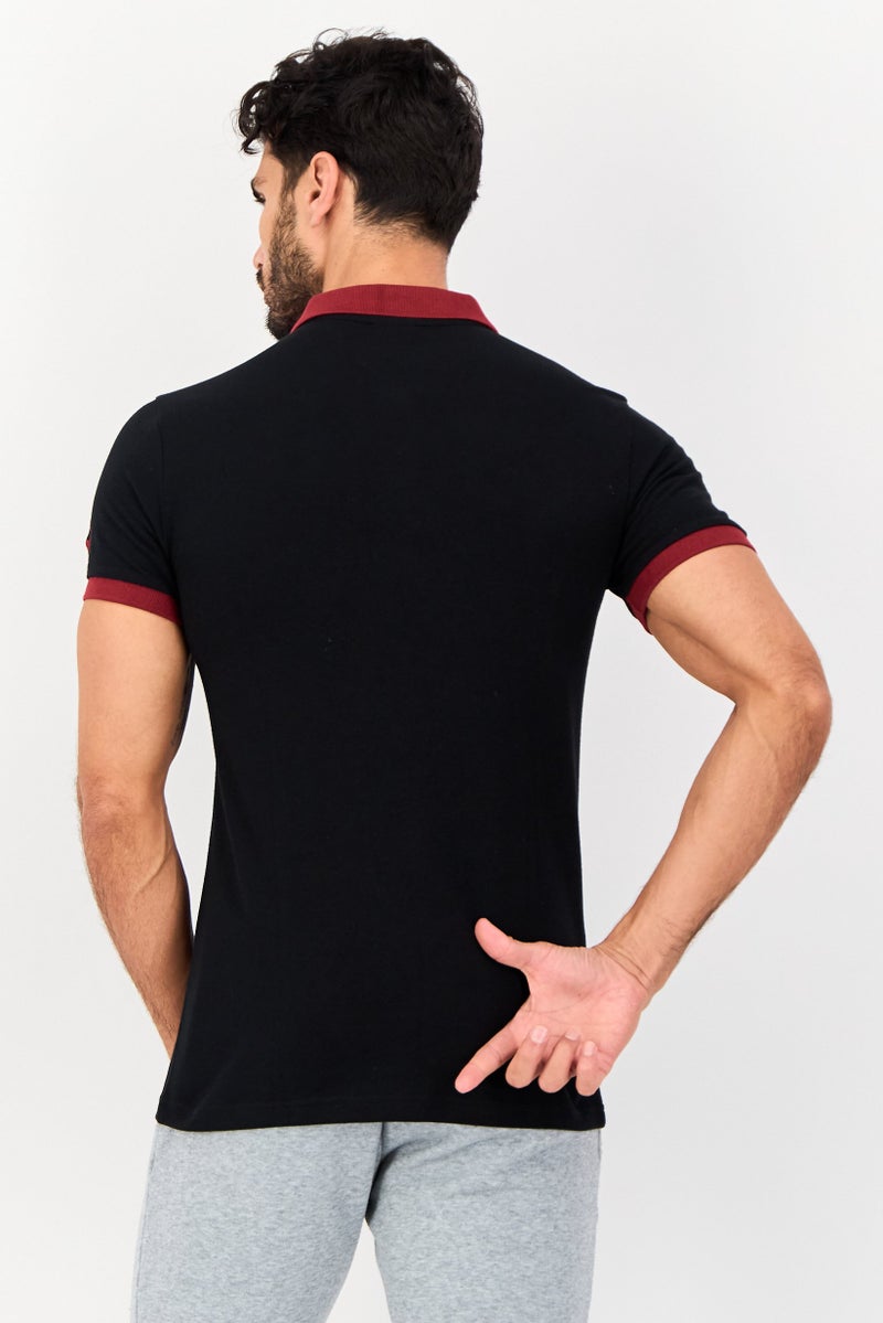 PUMA قميص بولو خارجي للرجال بقصة ضيقة بأكمام قصيرة، أسود - Image 2